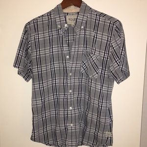 Short sleeved, button down plaid shirt
